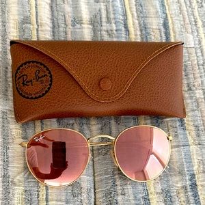 Ray-Ban glasses with pink reflective lenses